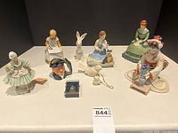 Overview of all nine figurines on display