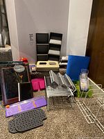 Group shot of all office supplies and organizers on carpet