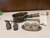 Group shot showing all pieces: tray with cellars & spoons, shakers, silk iron