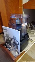 Braun EasyPrep food processor base, bowl, lid, pusher, manual in drawer