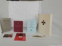 Group shot of all books, pamphlets and ephemera standing upright and lying flat