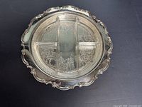 Front view of silver-plate tray with glass insert in place