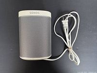 Full view of Sonos Play:1 speaker with attached white power cord