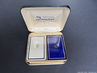 Open case showing both sealed decks inside