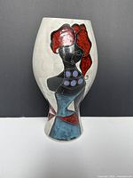 Front view showing full shape and painted abstract female figure