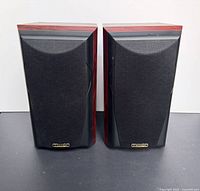 Front view of both Mission speakers with grills attached