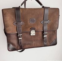 Front view showing overall design, logo patch and buckle straps