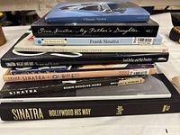 Stack showing CD set and eight books