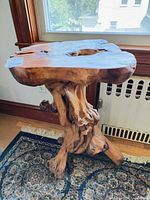 Front view of entire root wood table