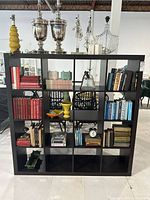 Front view showing 16 cubbies and finish