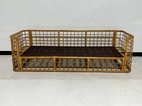 Front view of rattan daybed frame