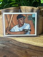 Front of Willie Mays commemorative card in sleeve
