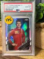 Front of PSA-slabbed Charles Leclerc refractor card showing grade and holographic card surface
