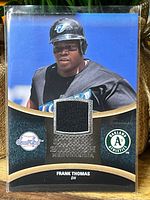 Front of card showing player image, jersey swatch and branding