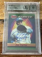 Front of 1994 Topps Finest Joe Carter card with blue autograph, Beckett slab label showing BGS 10 Autograph