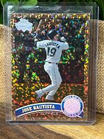 Front of Jose Bautista Topps Diamond Anniversary cognac parallel card in top-loader