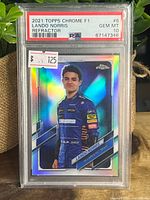 Front of PSA-slabbed Lando Norris Topps Chrome refractor card