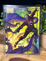 Front view of Star-Lord gold foil card in holder