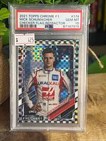 Front of PSA-encapsulated 2021 Topps Chrome F1 Mick Schumacher Checker Flag Refractor card showing Gem MT 10 grade