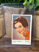 Front of Audrey Hepburn Serie X trading card in sleeve