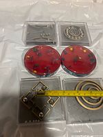 Six puzzles laid out showing maze styles and bearings