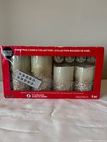 Boxed set of Ashland flameless LED candles with remote, front view