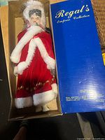 Doll in open Regal's Empress Collection box