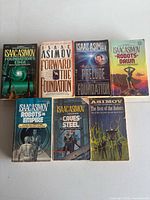 Front covers of seven Isaac Asimov paperbacks