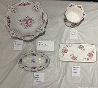 Group shot of all four bone china pieces laid on table