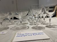 Side view of champagne coupes and wine goblets