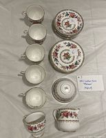 Complete ABJ Crofton Malvern tea set laid out showing 5 cups, 5 saucers, 6 plates, sugar bowl and creamer