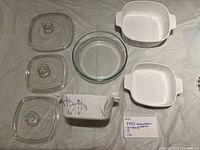 All three casserole dishes with lids and pie plate displayed