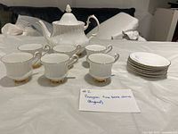 Front view of complete Paragon tea set: teapot, 6 cups, 6 saucers
