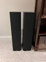 Front view of both DM603 S3 speakers with grilles attached