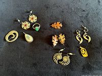 Overall view of all jewellery pieces on black background