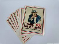 Stack of the 12 identical posters fanned out