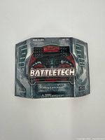 Front of sealed Battletech starter deck showing logo, edition marking, WOC 6301, price
