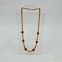 Full view of necklace hanging to show overall design and length