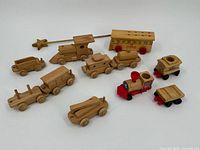 Group shot of all twelve wooden toy vehicles