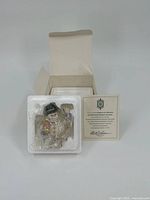 Ornament in styrofoam with box and COA