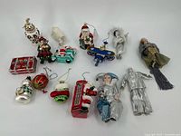 Group photo of all 15 assorted Christmas ornaments displayed on white background