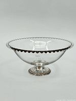 Full view of glass bowl with sterling foot