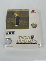Front view of PGA Tour 96 boxed game showing artwork, EA Sports logo, Windows 95 compatibility