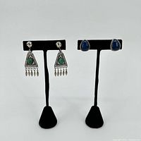 Both earring pairs on stands, full view