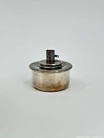 Front view of sterling silver coffee pot warmer