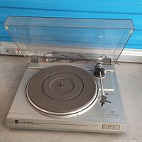 Full view of Dual CS 616Q turntable with dust cover open