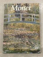 Front cover showing dust jacket with Japanese bridge artwork and titles