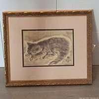Full view of framed print showing cat image and frame
