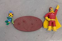 Front view of both figures and base