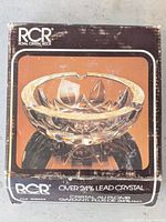 Box showing brand, model, lead content